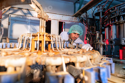 Preview: Beverage worker in drink factory found machine breakdown he check and call maintenance team service