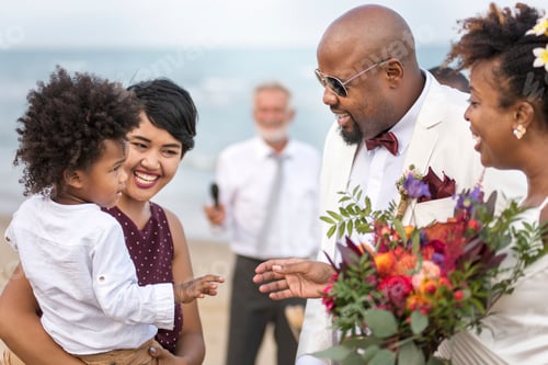 Preview: Happy bride and groom in a wedding ceremony at a tropical island