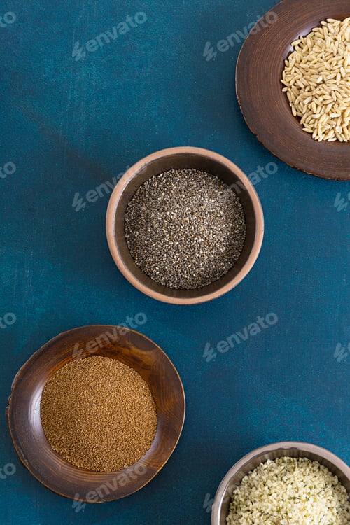 Preview: Healthy ingredients concept, lots of grains close-up isolated photo