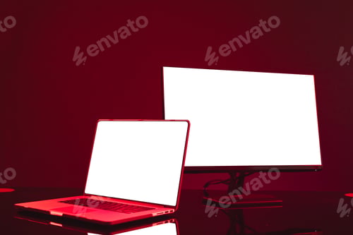 Preview: Composite of laptop and computer with copy space on neon background