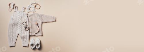 Preview: Knitted sweater, romper, hat, pants, shoes, bib, wooden toys and teether