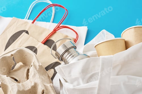 Preview: Reusable Shopping Bag with Recyclable Items on Blue