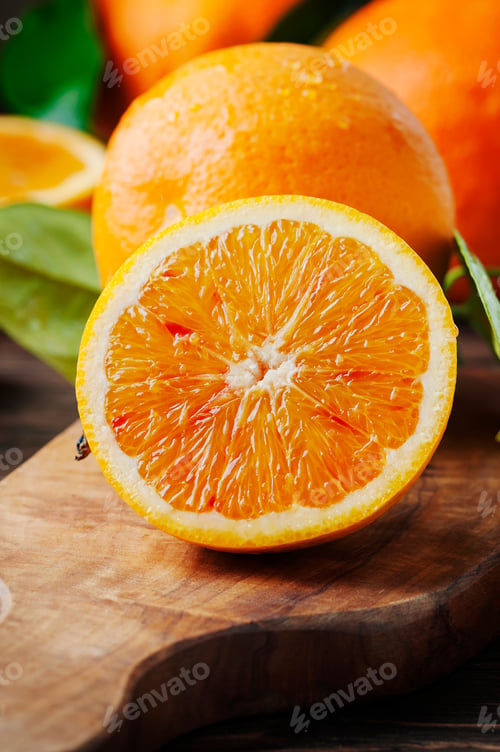 Preview: Fresh sweet oranges on the wooden table