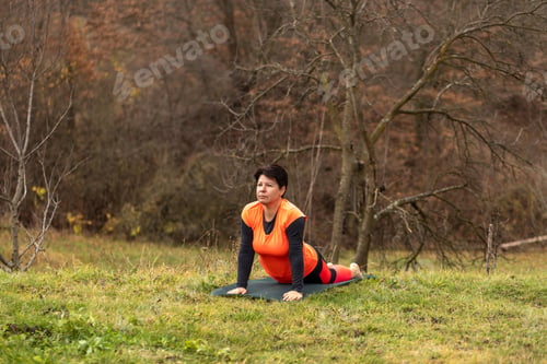 Preview: Woman performing yoga stretching