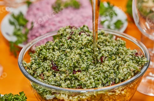 Preview: Traditional Tabbouleh Salad on Clear Dishes for New Year's Table