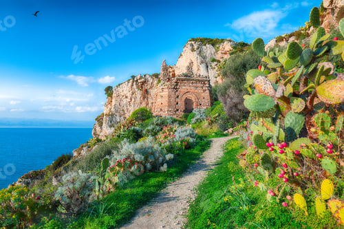 Preview: Dramatic spring sunrise on the the cape Milazzo panorama of nature reserve Piscina di Venere.