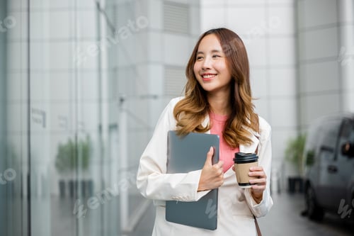 Preview: Cheerful Young Woman with Laptop and Coffee