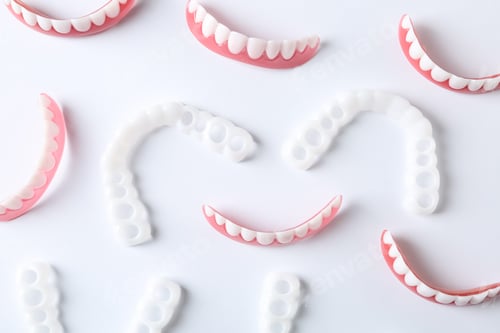 Preview: Flat lay composition with teeth covers on white background