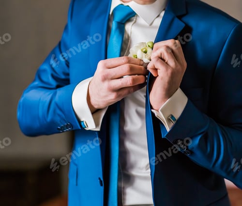 Preview: Groom wearing boutonniere