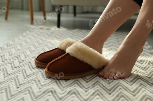 Preview: Woman in soft slippers at home, closeup
