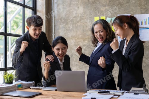 Preview: Group of young Asian businessmen raising their hands congratulating the success of the project. Pass