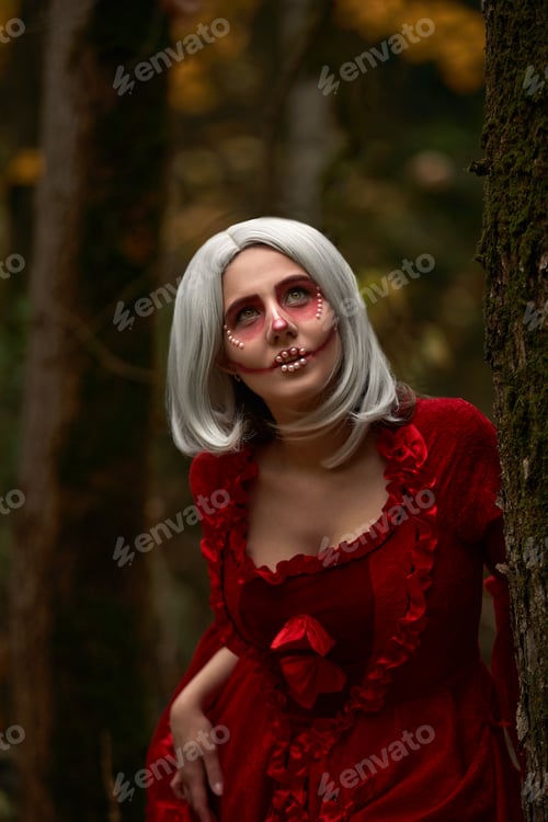 Preview: Halloween concept, glamorous costume detail. Young beautiful and mysterious woman in woods, in white