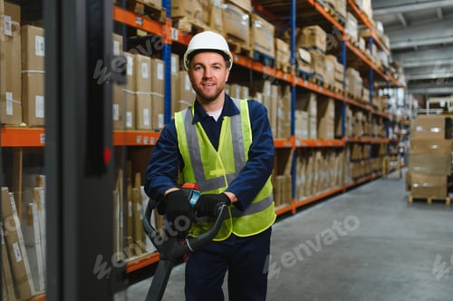 Preview: Man Driving Fork Lift Truck In Warehouse