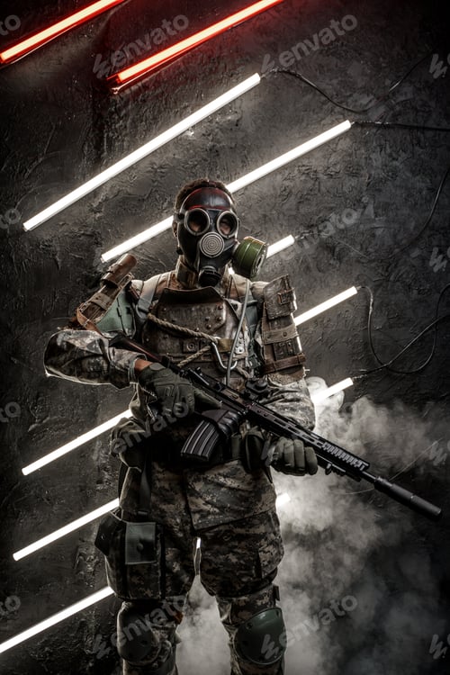 Preview: Dangerous soldier with gas mask against dark background