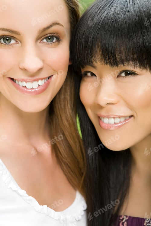 Preview: Two women sharing a joyful moment together