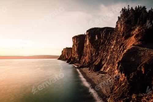 Preview: Aerial shot of high cliffs in Advocate Harbor in Nova Scotia at sunrise, Canada