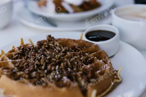 Preview: Delicious Waffle Topped with Nuts and Syrup