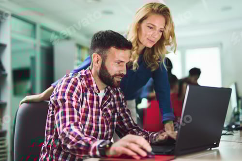 Preview: Programmers cooperating at information technology company