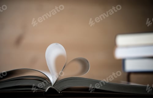 Preview: Pages of a book forming the shape of the heart. Love concept.