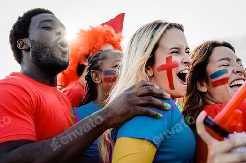 Preview: Crazy sport football fans in crowd celebrate red and blue team victory in stadium championship