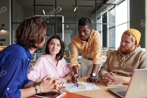 Preview: Discussing analytical data at meeting in office