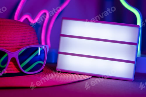 Preview: Summer time with blank light box and hat with sunglasses refection flamingo and cactus