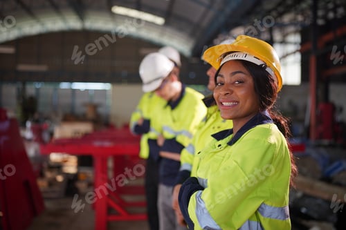 Preview: Robotics engineer working on maintenance of robotic arm in factory warehouse. Business technology.