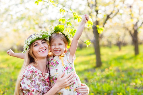 Preview: Happy mother and her little daughter in the spring day