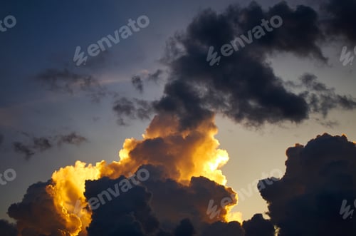 Preview: A dark cloud with a sunset in the clouds