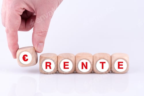 Preview: Closeup shot of a person taking a euro cube with the text rente