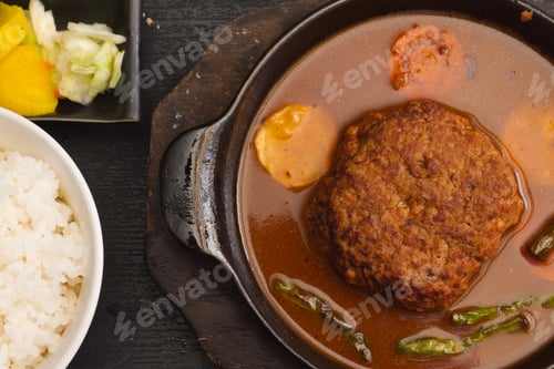 Preview: Japanese set menu. Pork burger in sauce, rice and vegetables
