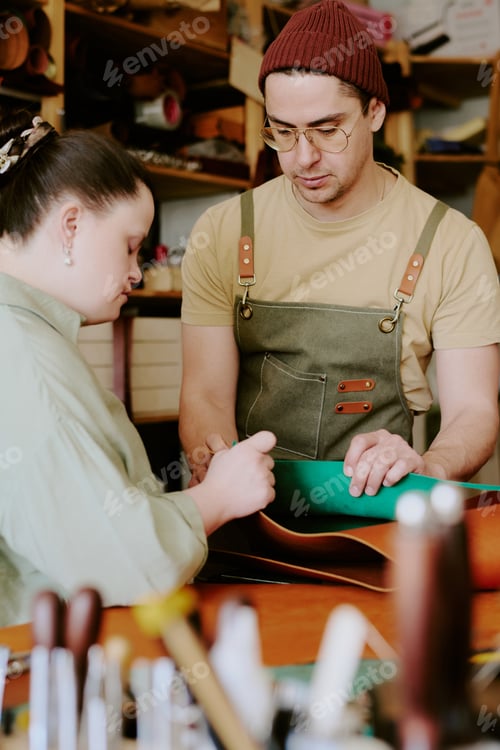 Preview: Male Tailor and His Client Choosing Fabric