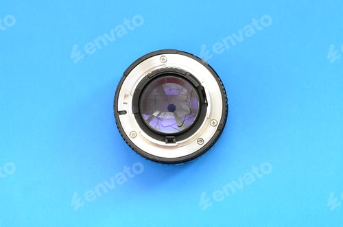 Camera Lens on a Bright Blue Background