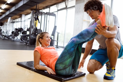 Preview: Portrait of happy fit people, friends exercising in gym together. Sport people workout concept