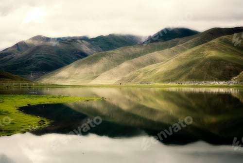 Preview: Hills reflected in a lake