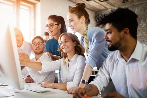 Preview: Group of young businesspeople or designers work with new startup project in office