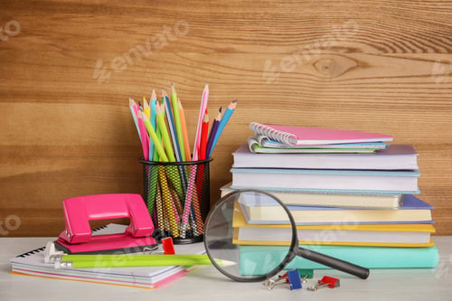 Preview: Different stationery on wooden table. Back to school