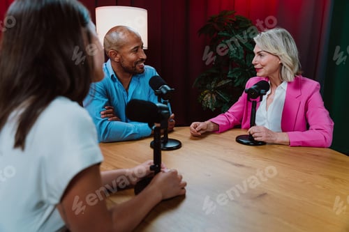 Preview: People recording a podcast interview in studio