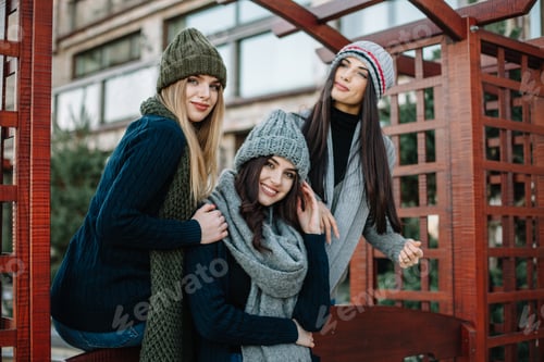 Preview: Three beautiful young girls posing against the backdrop of the park