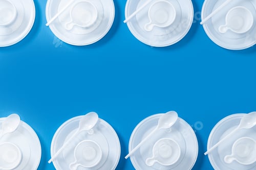 Preview: Disposable waste plastic on blue background