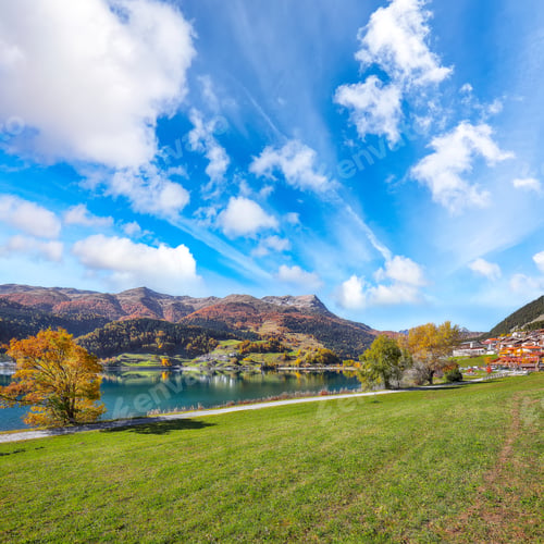 Preview: Picturesque autumn view of San Valentino village and Muta or Haidersee lake.