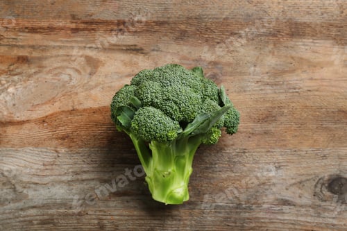 Preview: Fresh raw broccoli on wooden table, top view