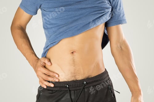 Preview: A man pulled up his shirt to reveal his belly.