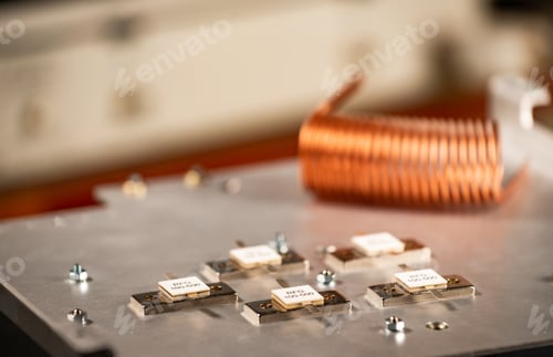 Preview: Close-up of five metal plates on a large iron case