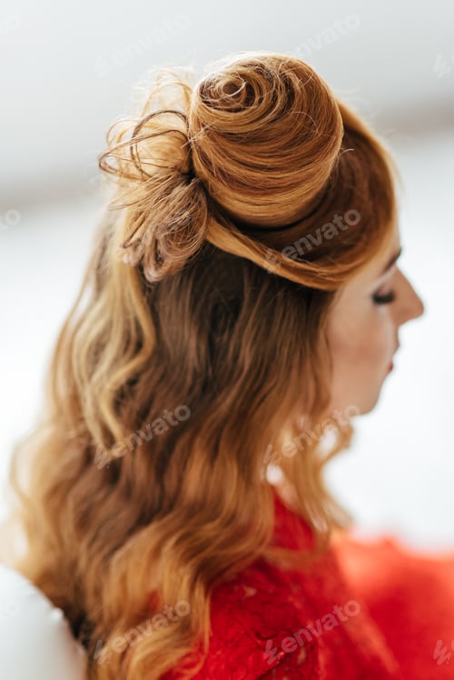 Preview: young girl with red hair in a bright red dress in a light room