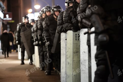 Preview: Here to create peace not voilence. The army barricading a riot in the city.