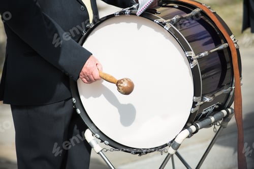 Preview: Details of hands playing the bass drum