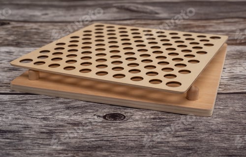 Preview: Wooden Peg Board on Wood Grain Background