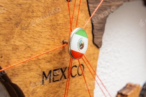 Preview: Mexico flag on the pin with red thread showed the paths on the wooden map.