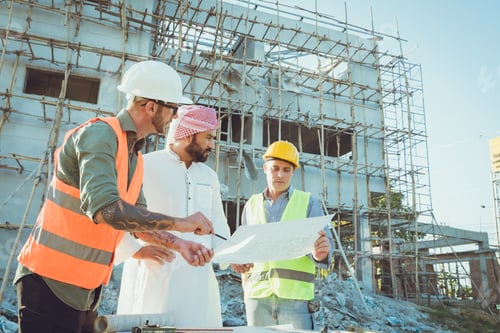 Preview: Arab construction engineer architect, Muslim builder working outdoor at construction site